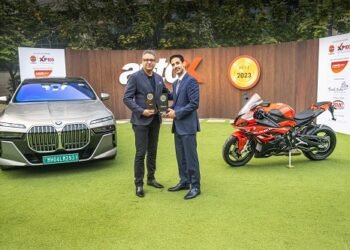 From L to R: Vikram Pawah, President & CEO, BMW Group India, receiving the 'Best of 2023' award(s) from Dhruv Behl, Founder and Editor-In-Chief, autoX