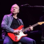 Former Dire Straits frontman Mark Knopfler will auction over 120 guitars and amps from his five-decade career, including the guitar used to record ‘Money For Nothing’ and played at Live Aid in 1985.