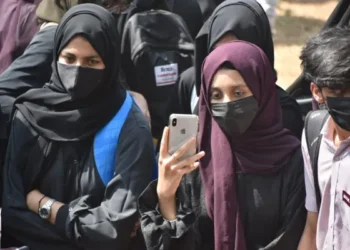 BJP MLA Balmukund Acharya is facing protests from Muslim students in Jaipur for allegedly not allowing them to wear hijab in a government senior secondary school. In Jaipur, several school girls jammed the road outside the Subhash Chowk police station and raised slogans against the BJP legislator.