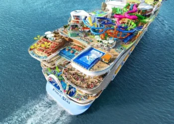 Royal Caribbean's 'Icon of the Seas' cruise ship, the world's largest, sets sail from Miami with cutting-edge technology and environmentally friendly features.