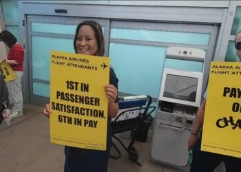 Alaska Air flight attendants authorized a strike mandate for the first time in three decades, as thousands of cabin crew across three unions picketed for higher pay outside airports in the United States, the UK and Guam on Tuesday.