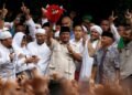 Voting has begun in Indonesia's presidential election, with over 200 million voters casting their ballots to elect a new president and vice president, as well as parliamentary and local representatives. Concerns over the cost of living and human rights have dominated the campaign.